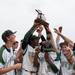 Huron holds up their district championship trophy, Saturday, June 1.
Courtney Sacco I AnnArbor.com 